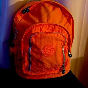 Kipling Expandable Backpack bright orange very clean smoke free environment 19in